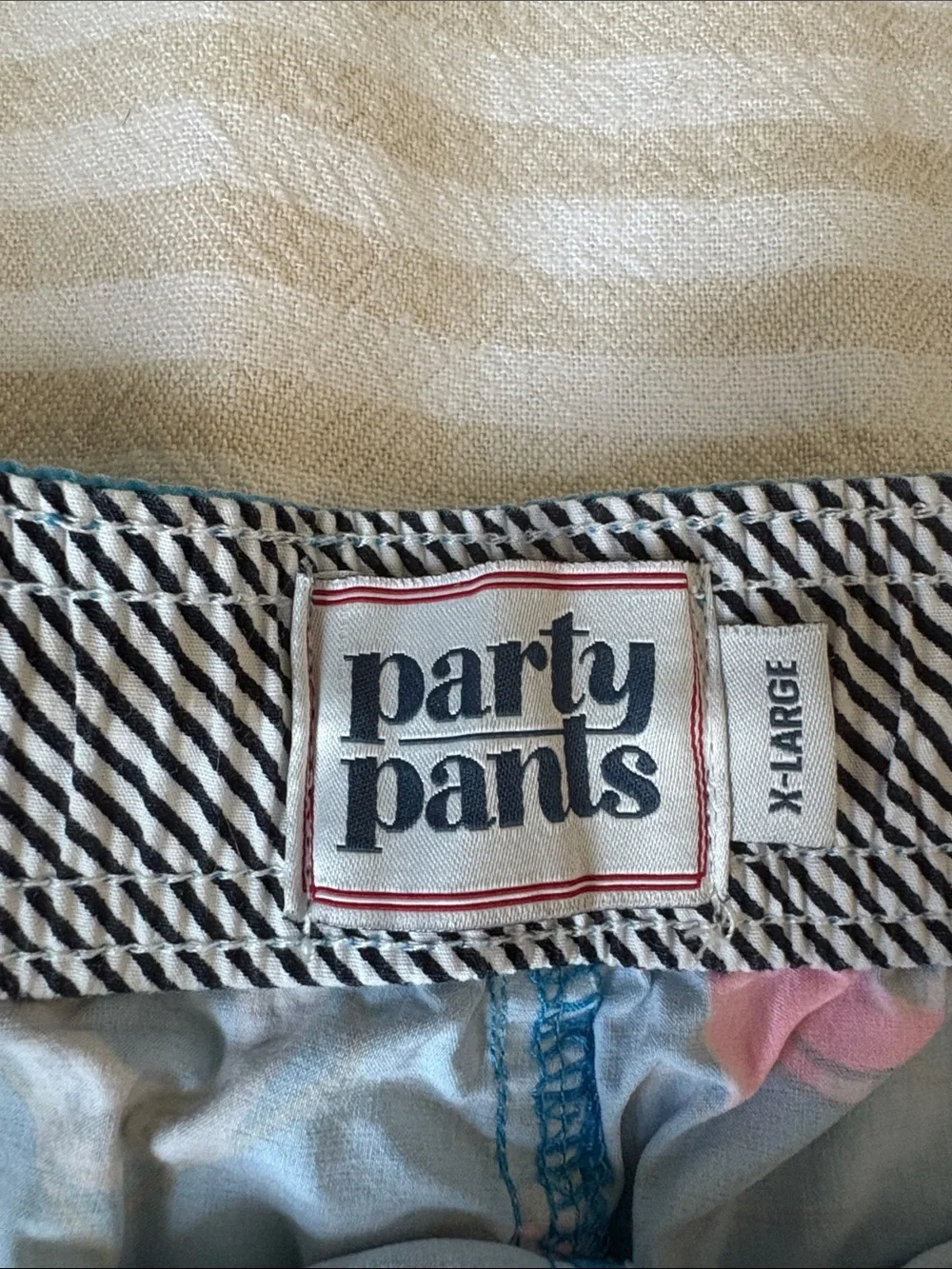 Party Pants- Teal Swim Shorts with Pink Dolphin Print